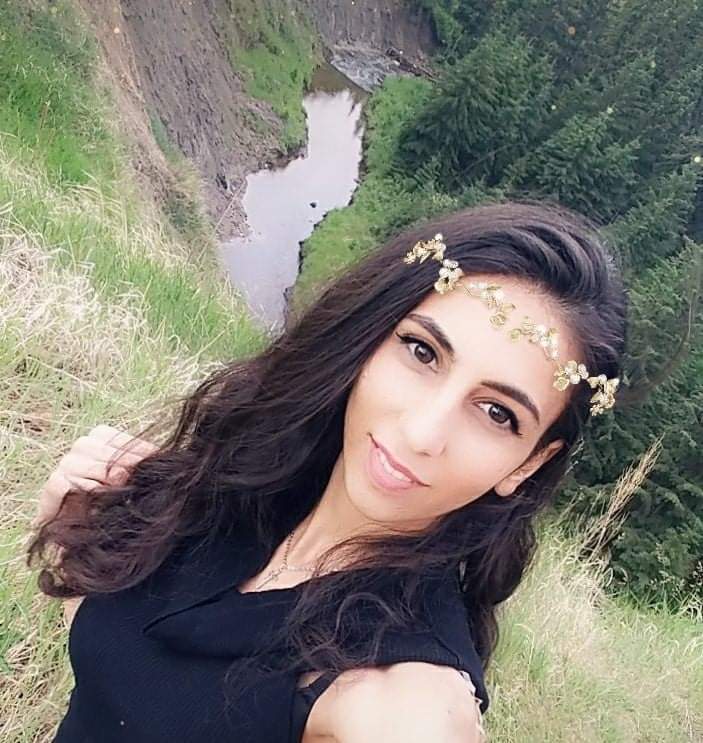 selfie of young woman outside